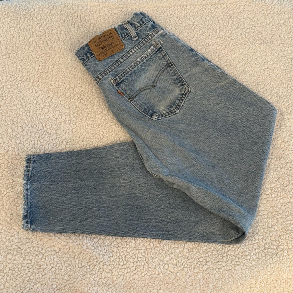 Vintage Levi's 560s Light Blue Denim Distressed Jeans Size 34x32 Made in USA